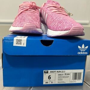 Adidas women or girls shoes size 6 US. Pink and color new with the box.